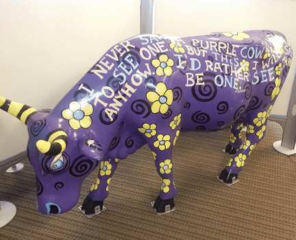purple cow statue